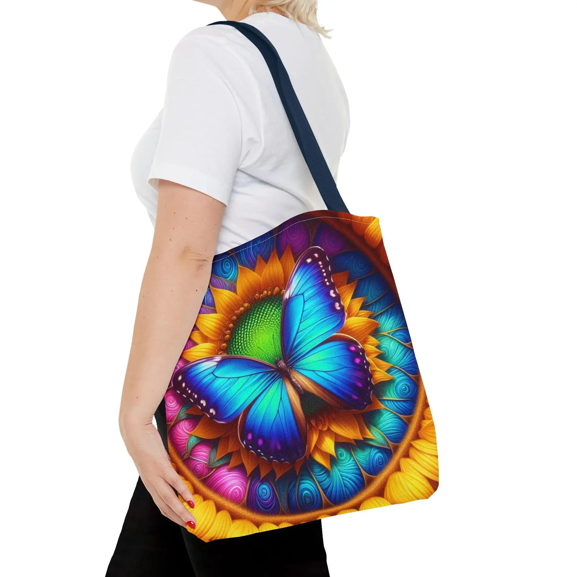 Person holding a colorful bag with a butterfly design on a white background