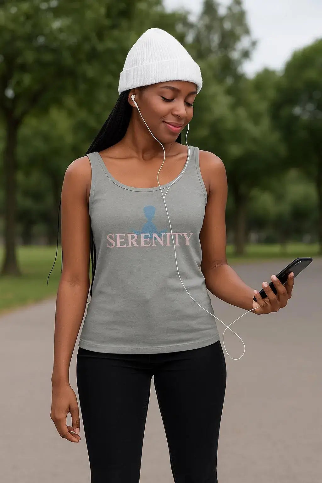 Woman wearing a 'Serenity' tank top in a park