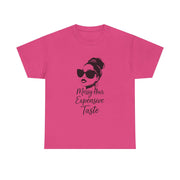 Pink t-shirt with a graphic of a woman with sunglasses and text on a white background