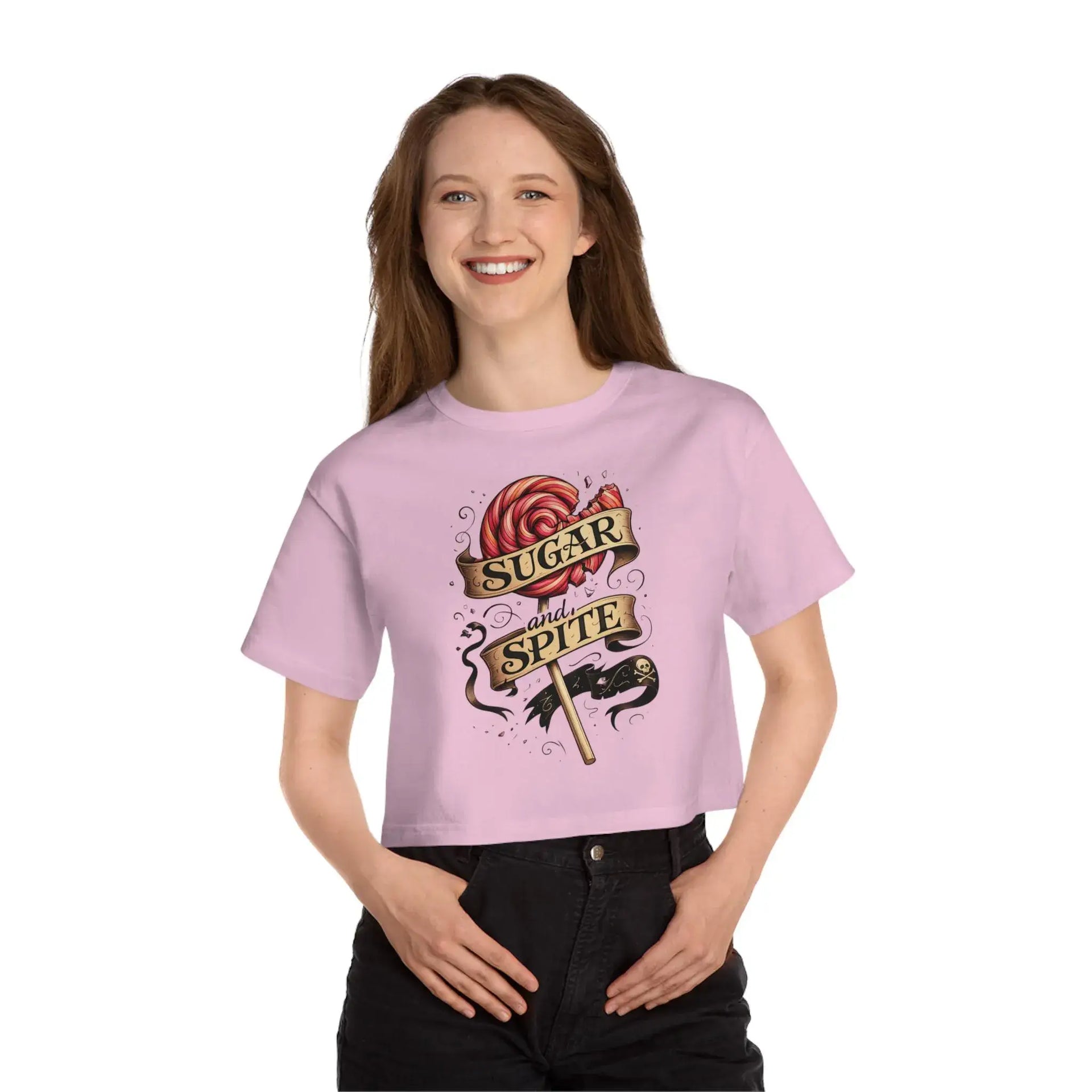 Person wearing a pink t-shirt with a graphic design and text on a white background