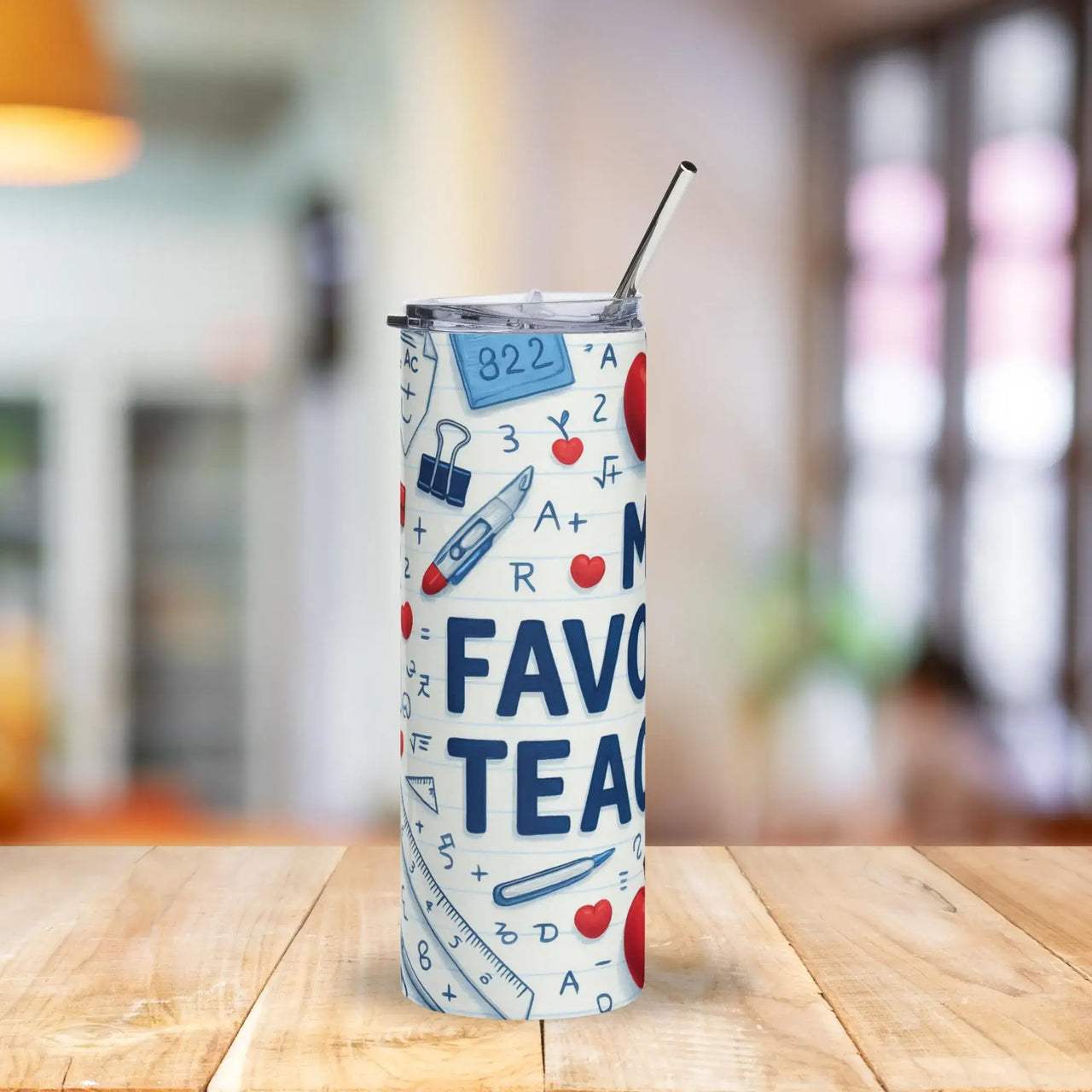 Tumbler with educational design on a wooden table