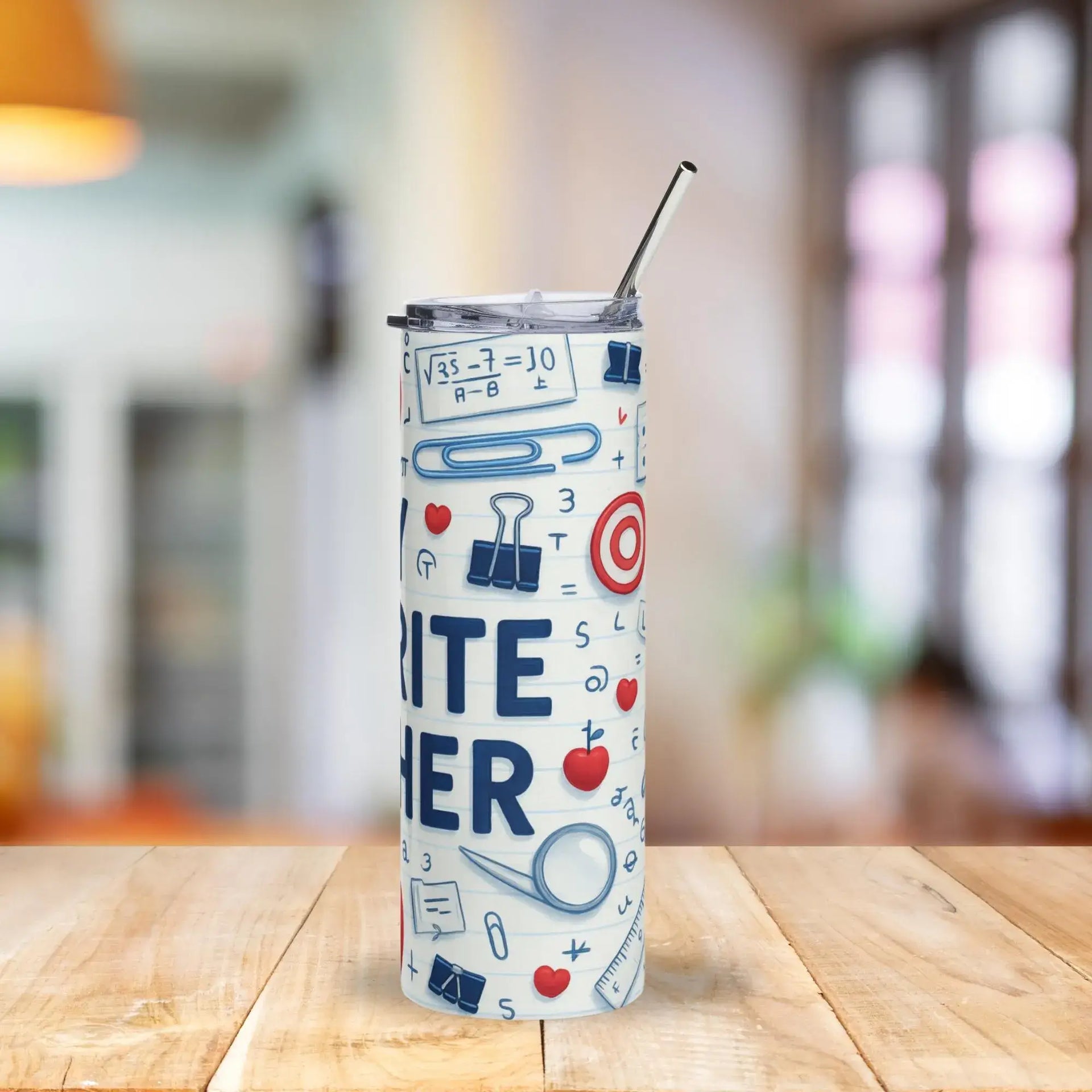 Tumbler with educational design on a wooden table