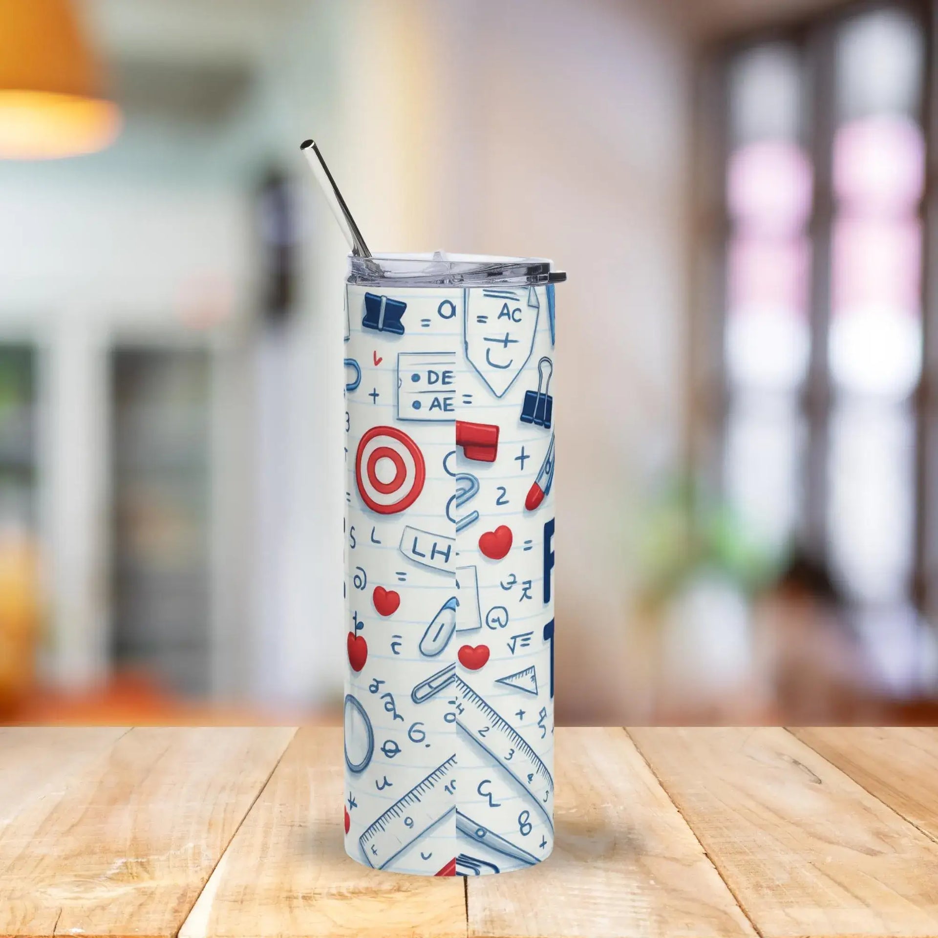 Tumbler with educational design on a wooden table