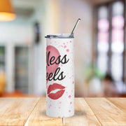 Tumbler with 'less heels' design on a wooden table