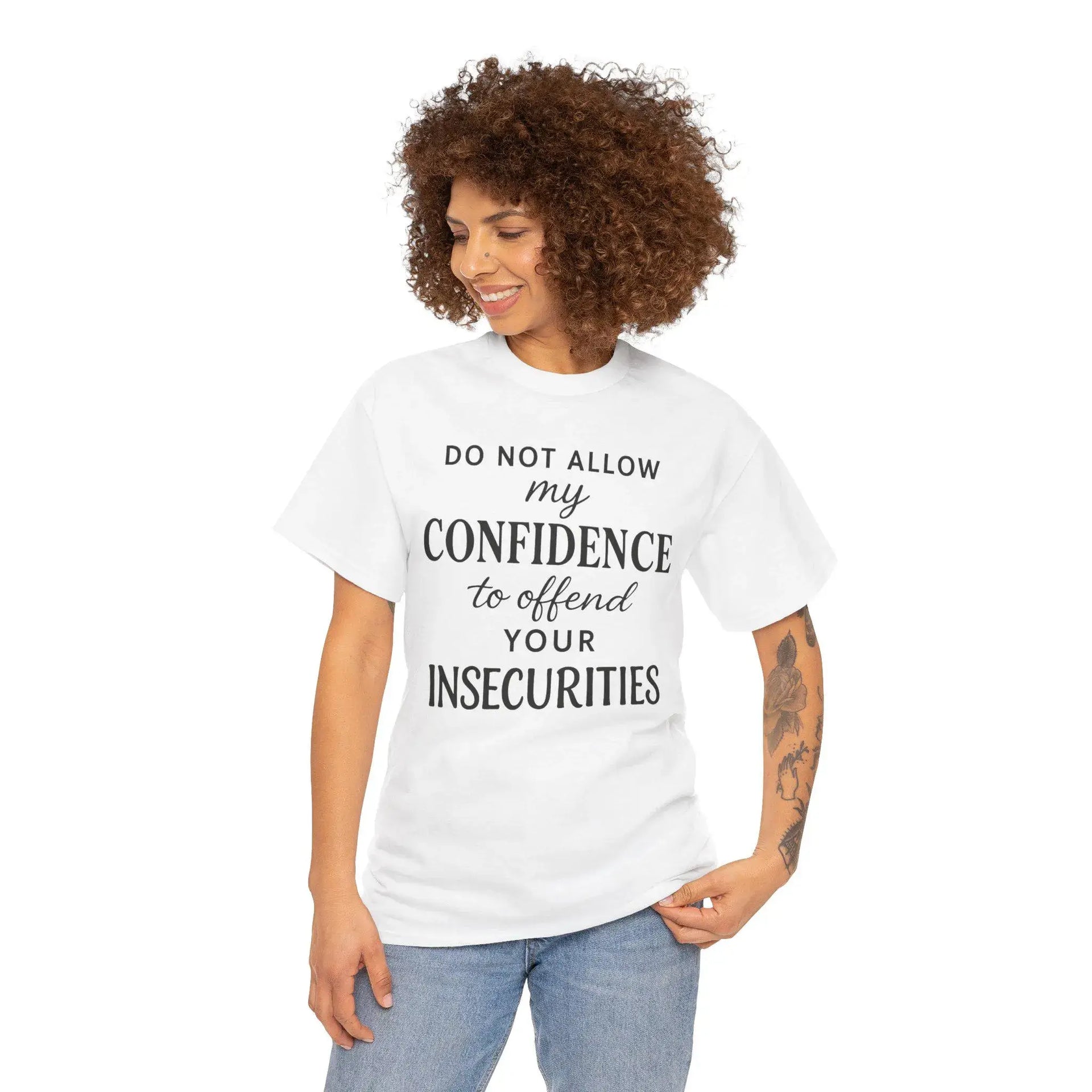Woman wearing a white t-shirt with a motivational quote on a white background