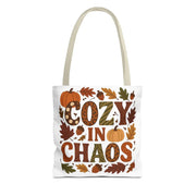Tote bag with autumn-themed design and text on a white background