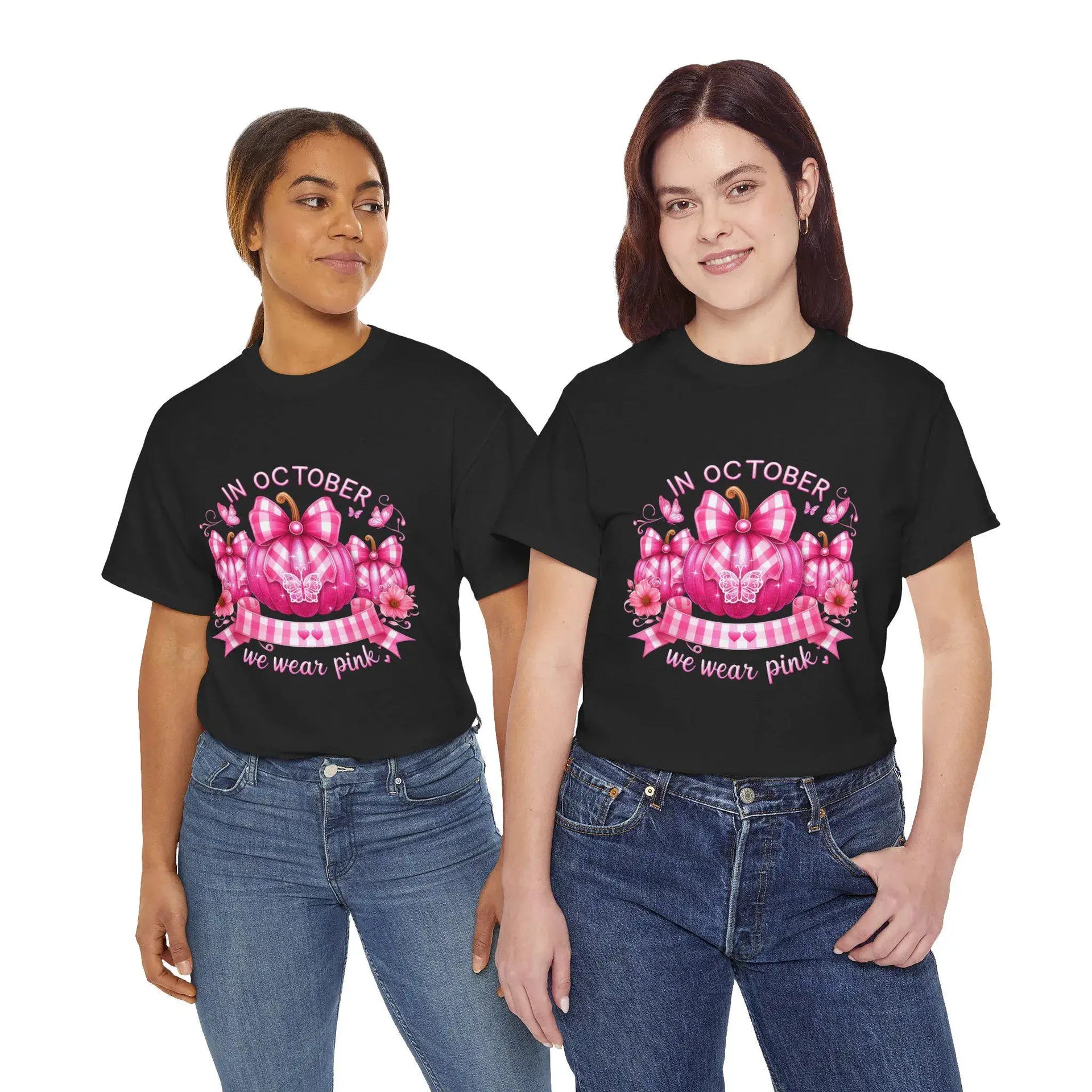 Two people wearing black t-shirts with a pink breast cancer awareness design.